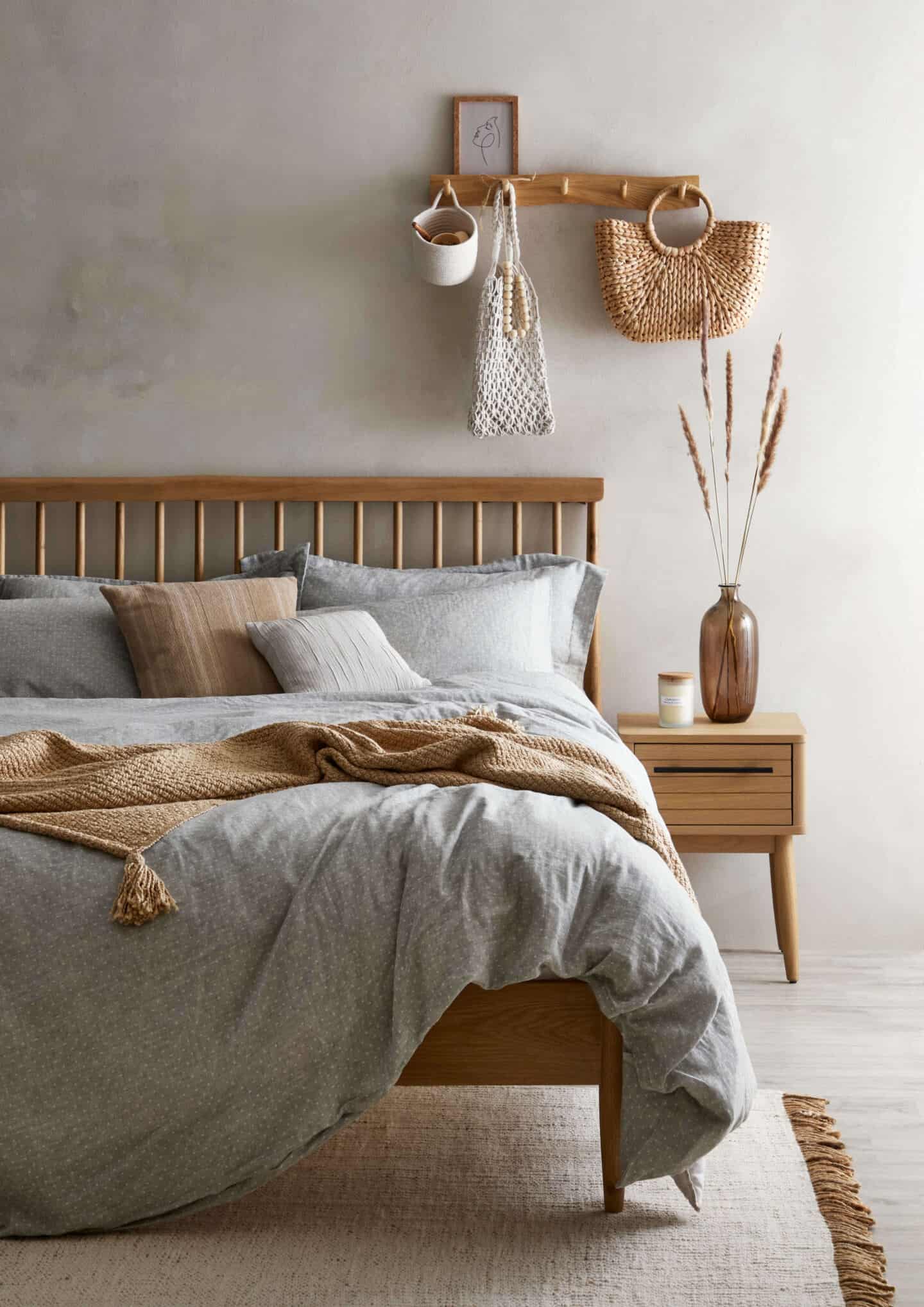 Interior Trends for 2022: Organic Minimalism. The Edited Life Collection from Dunelm. A double bed in a Scandi style 