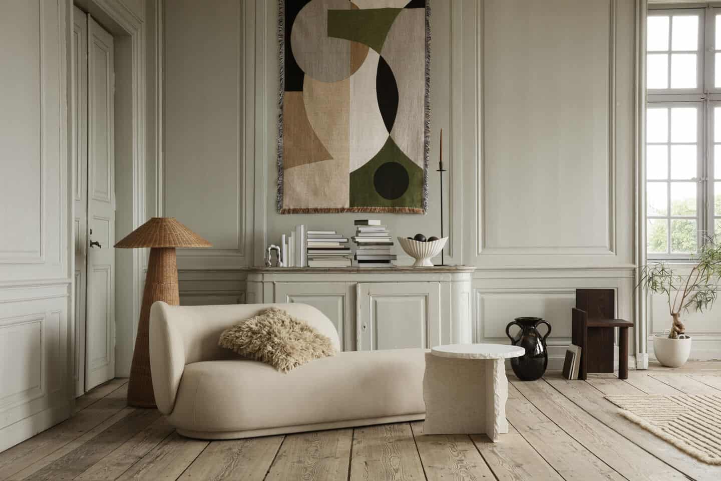 Interior trends for 2022 - Organic Minimalism. Ferm Living furniture in front of panelled walls.