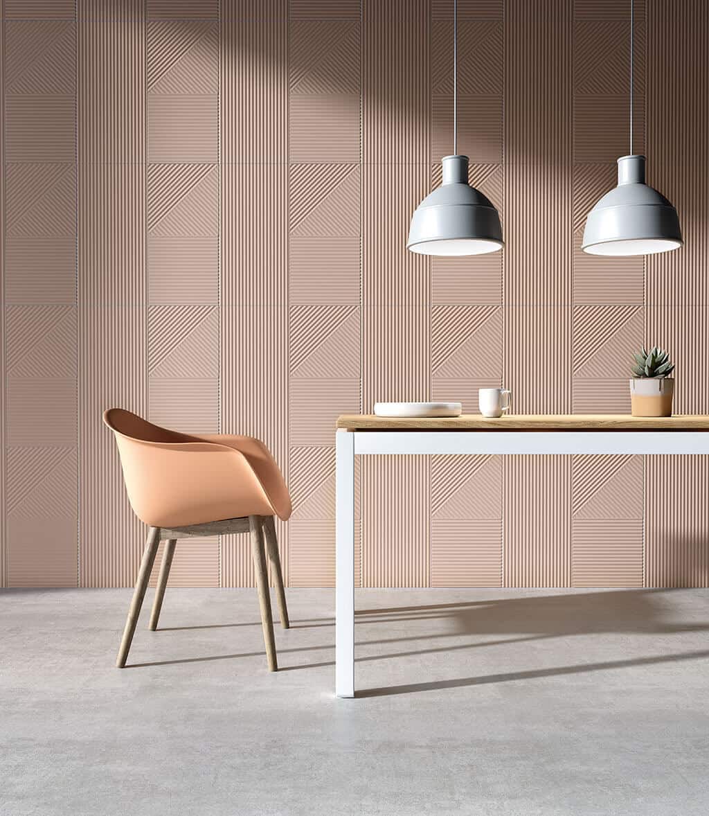 Linea textured wall tiles from European Heritage with a dining table and chair in front and two lights suspended above