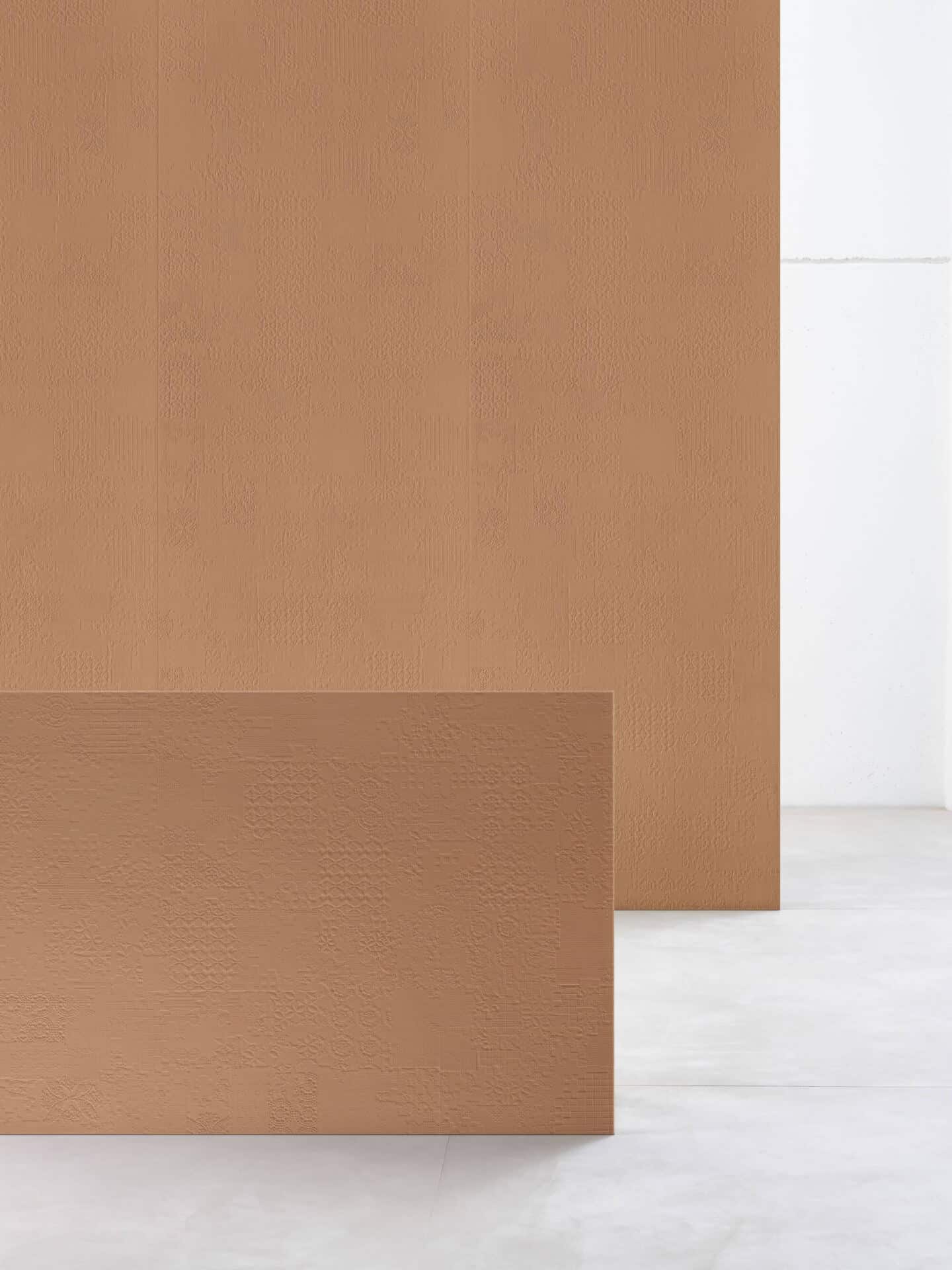 Large scale textured wall tiles from Mutina stand up and act as screens