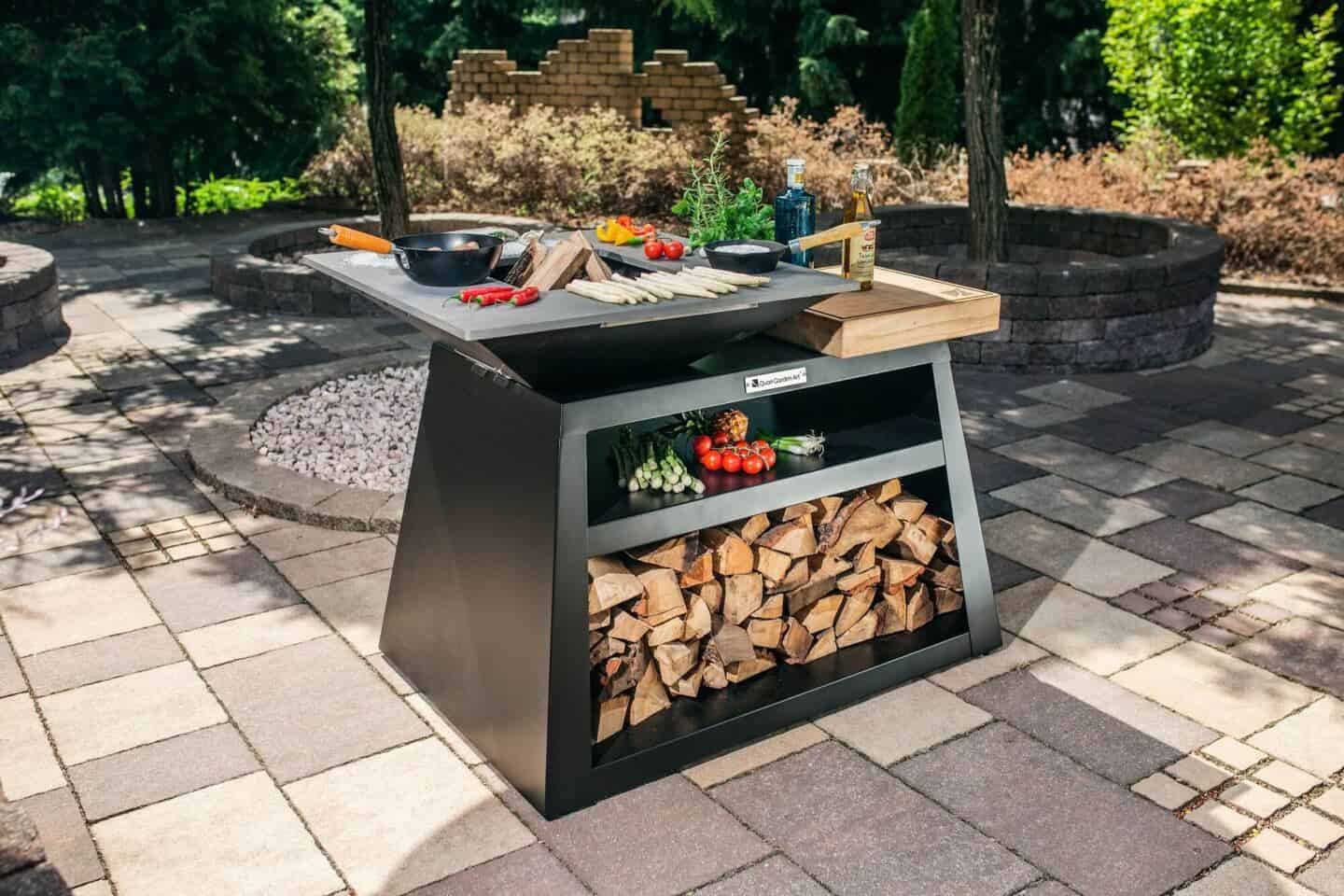 Outdoor patio space featuring a wood fired bbq