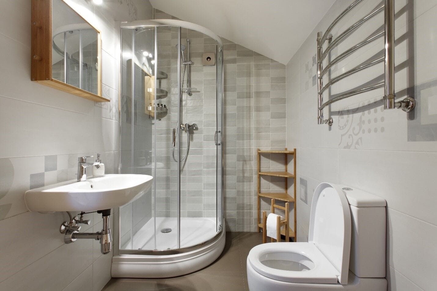 A small bathroom designed with custom shower doors