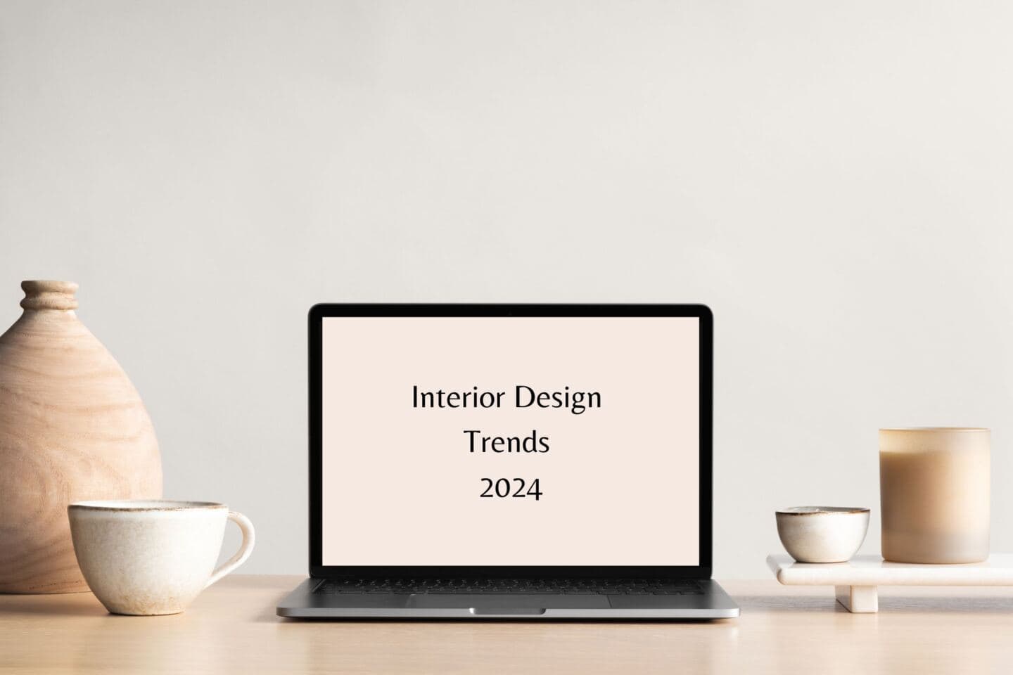 A laptop screen that has the words "interior design trends 2024" on it