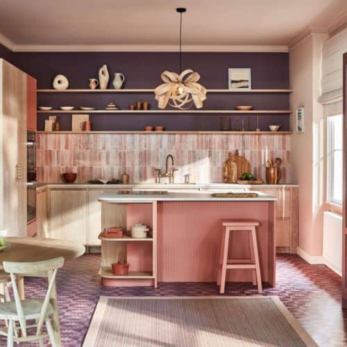 A modern pink and purple kitchen